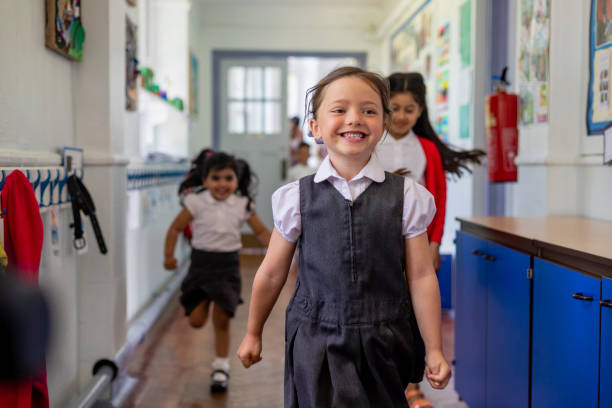 Primary school students running